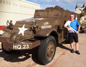 The "old git" outside the Musee du Debarquement - beside one of the many reminders of its military history.