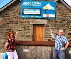 The "old git" and "old gal" at the sign marking the official "Grand DEpart" of the 2016 Tour de France.